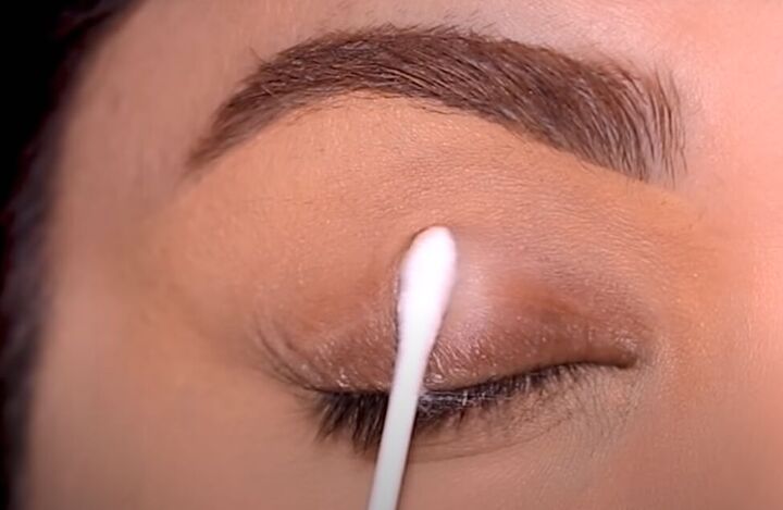 how to fix patchy eyeshadow tips for getting perfect eye makeup, Cleaning the eyelid with a cotton swab