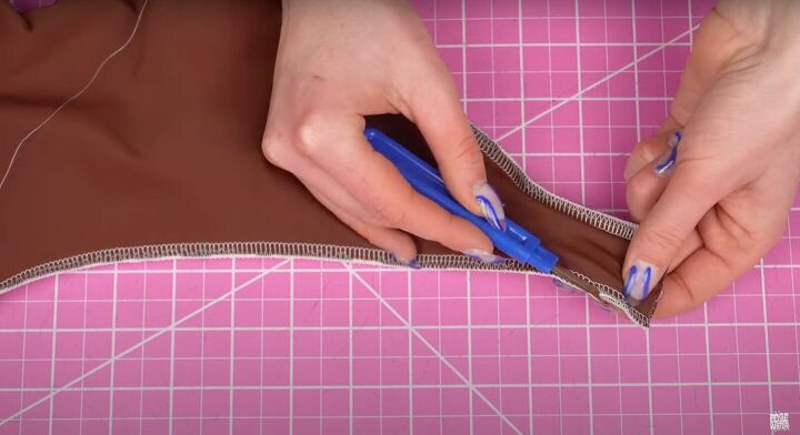 how to make a sexy diy swimsuit with a wrap tie perfect for summer, Seam ripping a hole for turning the fabric