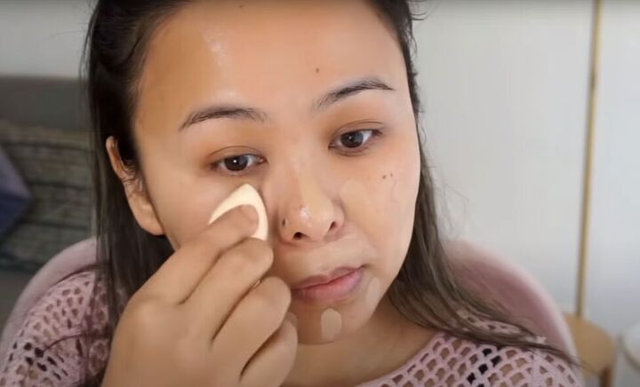 date night makeup how to create a soft glamorous look for a date, Applying foundation with a makeup sponge