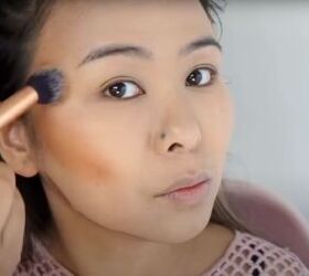 date night makeup how to create a soft glamorous look for a date, Blending the contour with a fluffy makeup brush
