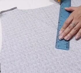 how to make a diy cardigan tube top mini skirt set from a sweater, Drawing a V shaped neckline