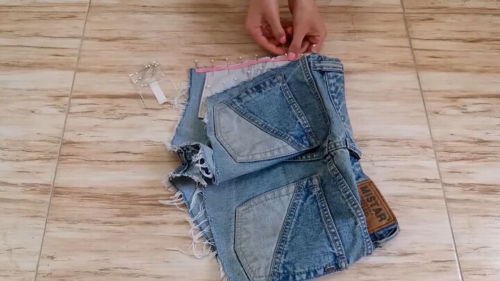 how to make diy lace up shorts without eyelets in just 10 minutes, Sewing the ribbon to the shorts