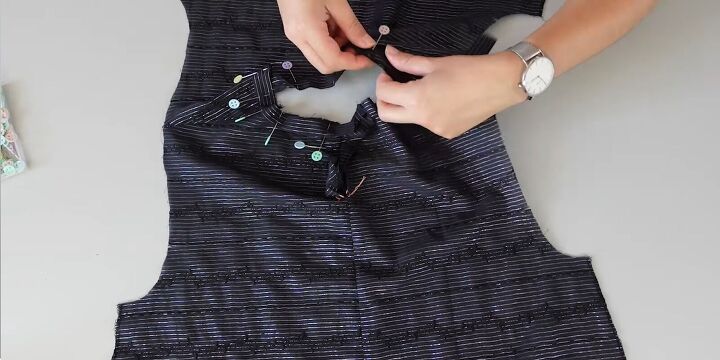 how to sew a cute diy babydoll dress using a pattern, Attaching the bias tape to the top
