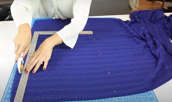 how to make an easy diy swimsuit cover up for the beach or pool, Cutting the fabric with a rotary cutter