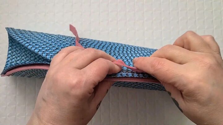 how to make a zippered clutch purse out of a placemat, How to make a clutch purse