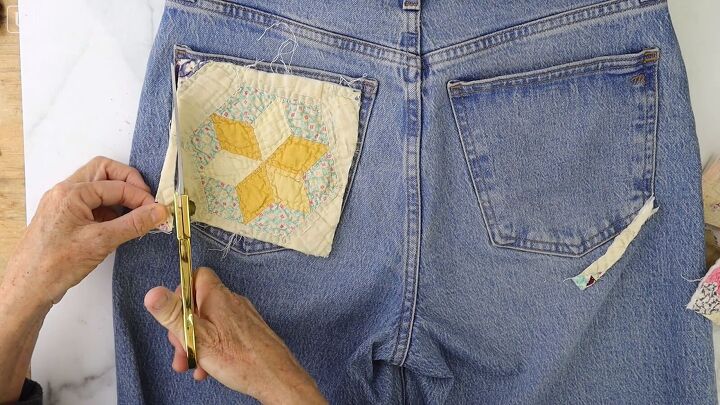 how to make cute patchwork jeans out of old fabric scraps, Adding a patch to the back pocket