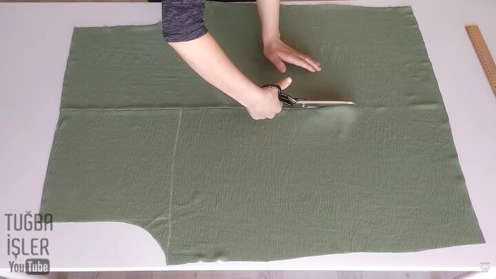 how to make easy sew palazzo pants without using a pattern, Cutting down the center of the pattern