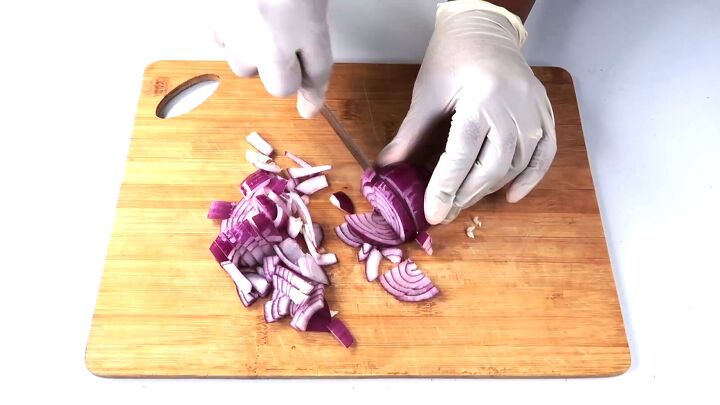 how to make an effective diy onion oil for hair growth, Cutting and dicing the onion