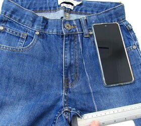how to make a cute diy cell phone bag out of jean pockets, Marking where to cut the jeans
