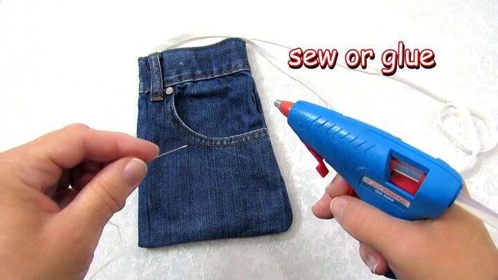 how to make a cute diy cell phone bag out of jean pockets, Cell phone bag made from jean pocket