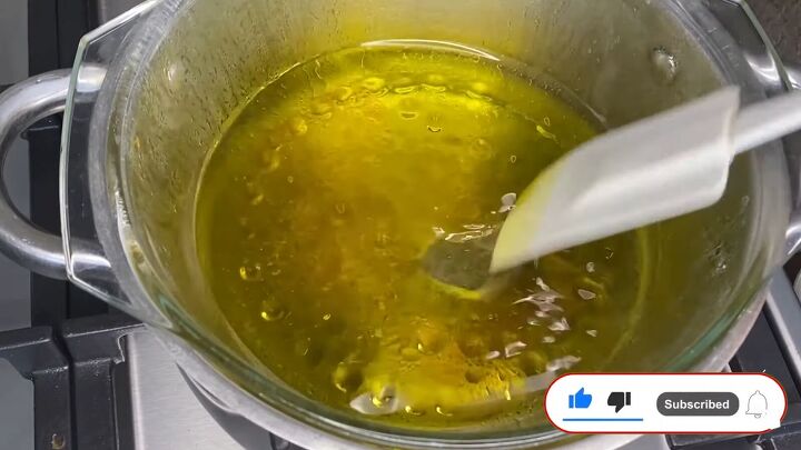 how to make a diy hair growth oil with only 2 ingredients, Heating the mixture using a double boiler