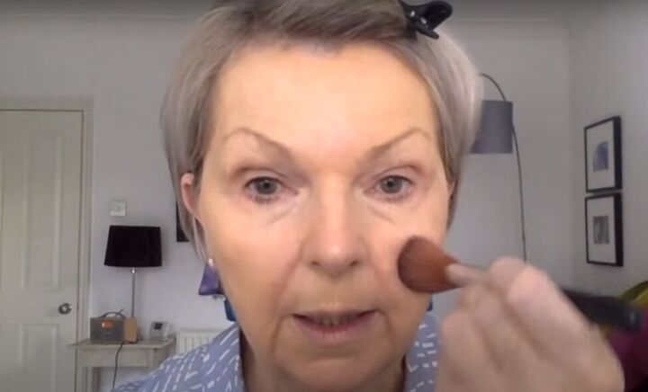 quick makeup for over 50s how to apply makeup for older women, Applying blush with a large makeup brush