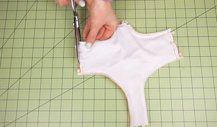 how to sew strappy bikini bottoms in 2 different styles, Trimming the excess fabric
