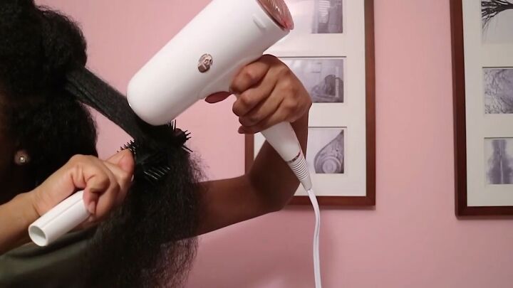 how to do a blowout on natural hair in 4 simple steps, Blow drying hair with a round brush