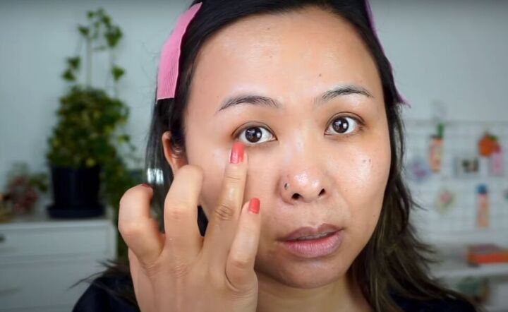 light fresh no foundation makeup look that s perfect for summer, Applying color corrector