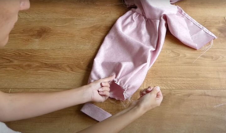 how to sew a dreamy diy ruffle dress out of old curtains, Attaching the cuffs to the sleeves