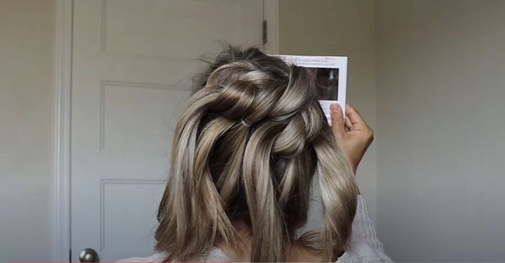 how to do a high bun wedding hair updo in 7 easy steps, Long hair tied in knots