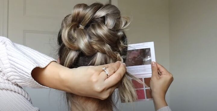how to do a high bun wedding hair updo in 7 easy steps, Crossing the twist over to the back