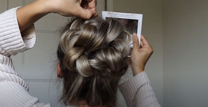 how to do a high bun wedding hair updo in 7 easy steps, Pinching and pulling the loops