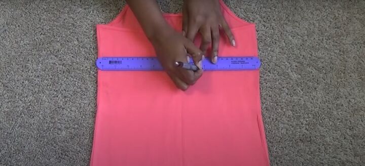 how to easily make a cute diy color block dress from 3 tank tops, Using a ruler to mark a straight line