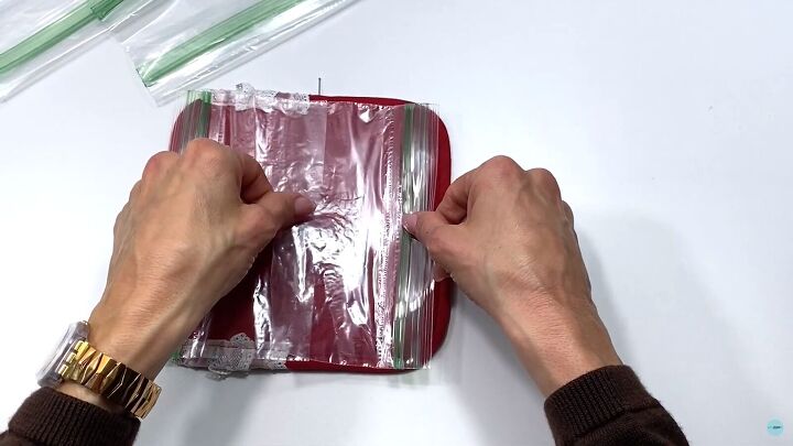 make your own toiletry bag out of a pot holder sandwich bags, Placing the ziplock bags