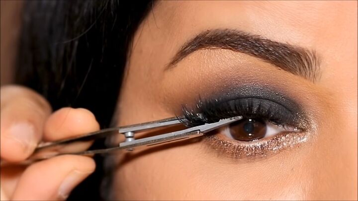 how to do a glam black smokey eye with glitter without making a mess, Glitter smokey eye look with false lashes