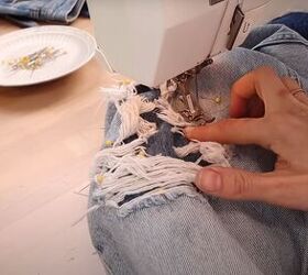how to fray jeans in 7 different ways distress crop fray more, Sewing the patches