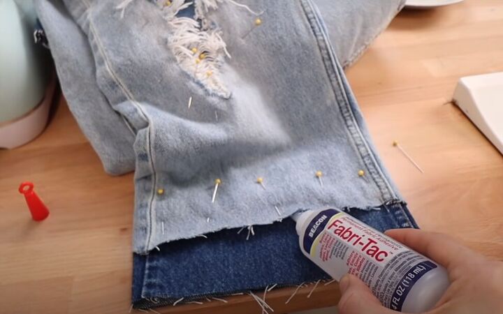 how to fray jeans in 7 different ways distress crop fray more, Using fabric glue instead of sewing