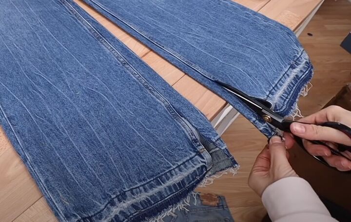 how to fray jeans in 7 different ways distress crop fray more, Cutting slits in the sides