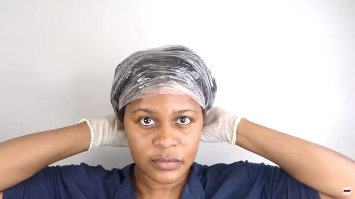 how to make a diy onion juice that promotes hair growth, Covering hair with a plastic cap