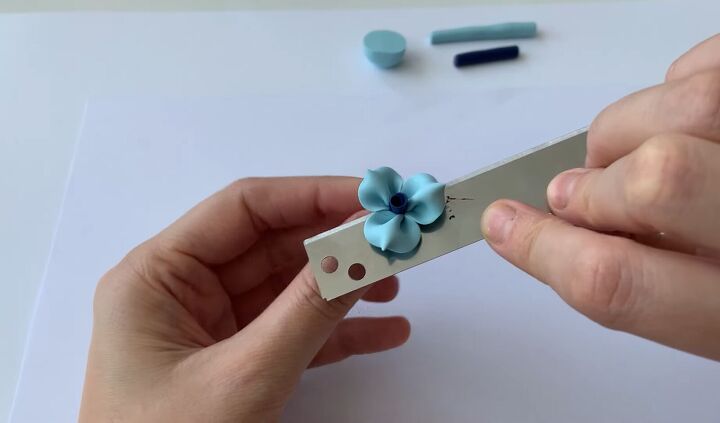 how to make a flower out of polymer clay part 3 three petal flower, Cutting the stem