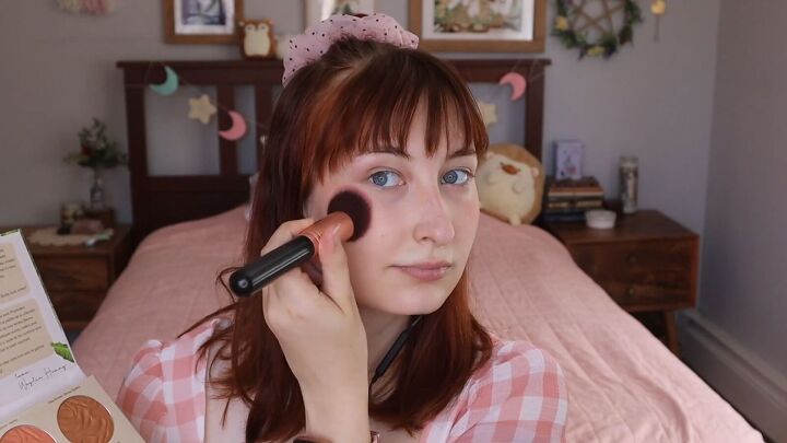 how to do a cute cottagecore makeup look in 7 simple steps, Applying blush with a wide brush