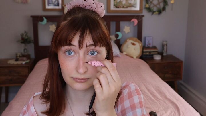 how to do a cute cottagecore makeup look in 7 simple steps, Drawing freckles on the nose
