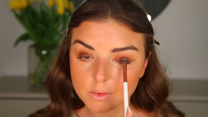 how to apply faux freckles for a sun kissed summer makeup look, Blending brown shades of eyeshadow