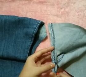 how to make a cute diy denim top out of old jeans, Cutting the jeans along the crotch