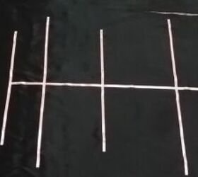Why she's pinning ribbons across fabric before cutting it