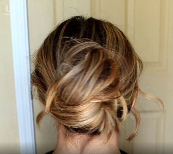 7 quick easy french pin hairstyles that look effortlessly chic, Messy bun French pin hairstyle