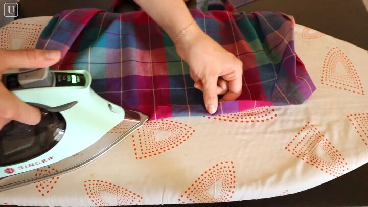 how to sew a cute tank top out of an old tablecloth, Hemming the bottom of the top