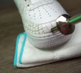 how to make textured diy croc skin sneakers with a wood burning tool, Using a wood burning tool to engrave croc print