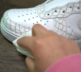 how to make textured diy croc skin sneakers with a wood burning tool, Rubbing off the debris