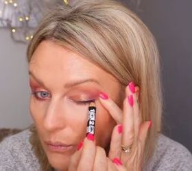 how to create a glamorous makeup look for hooded eyes in 5 minutes, Sweeping eyeliner halfway across lid