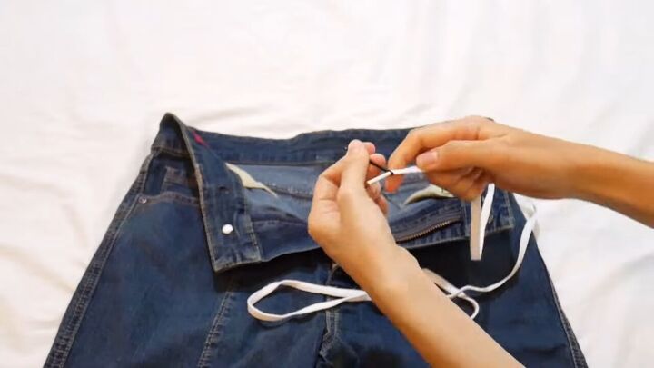 how to make jeans tighter without a belt diy shoelace hack, Inserting the shoe lace into a bobby pin