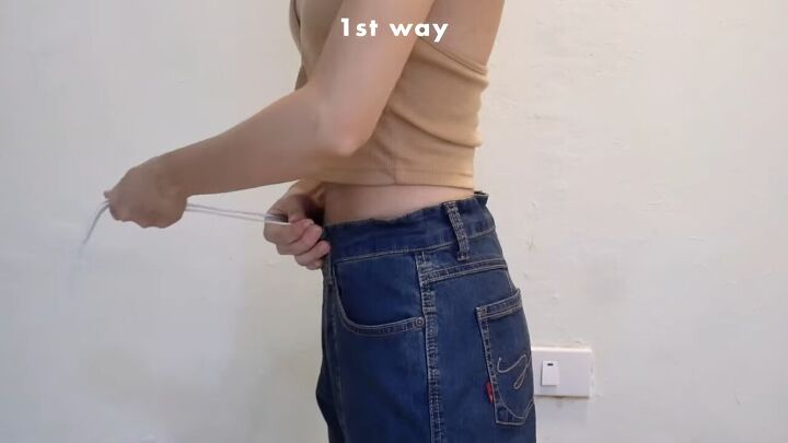 how to make jeans tighter without a belt diy shoelace hack, Pulling the shoe lace ends