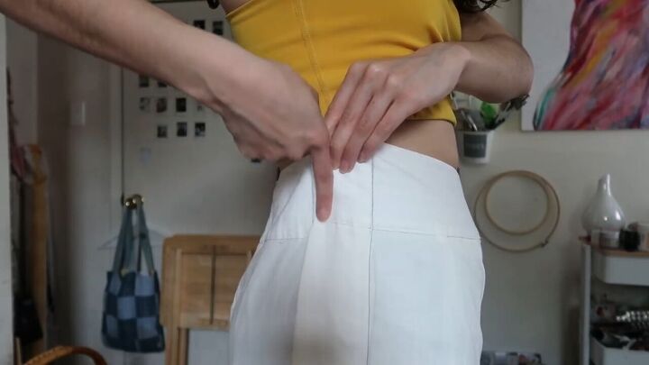 how to take in a skirt quickly easily in 3 simple steps, Folding the flap down ready to topstitch
