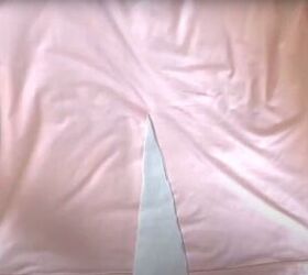 how to make a wrap top out of a t shirt without sewing a stitch, Cutting a narrow triangle shape