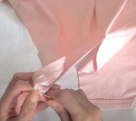 how to make a wrap top out of a t shirt without sewing a stitch, Seam ripping the hem