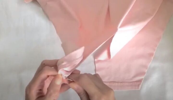 how to make a wrap top out of a t shirt without sewing a stitch, Seam ripping the hem