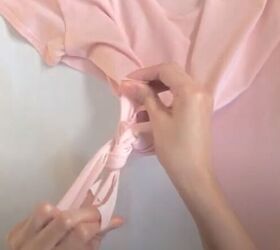how to make a wrap top out of a t shirt without sewing a stitch, Tying the ties to the t shirt
