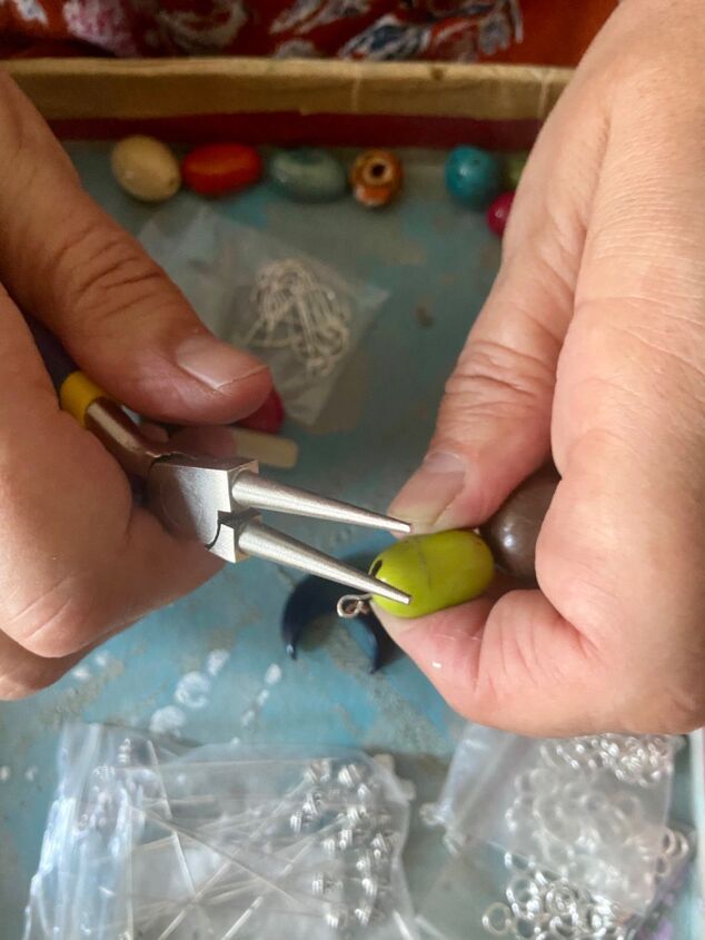 how to create a pair of tagua nut original earrings, Tighten loop