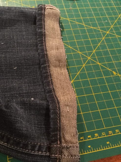 sewing euro hem on jeans elise s sewing studio, Hem strip pinned to cut jeans leg